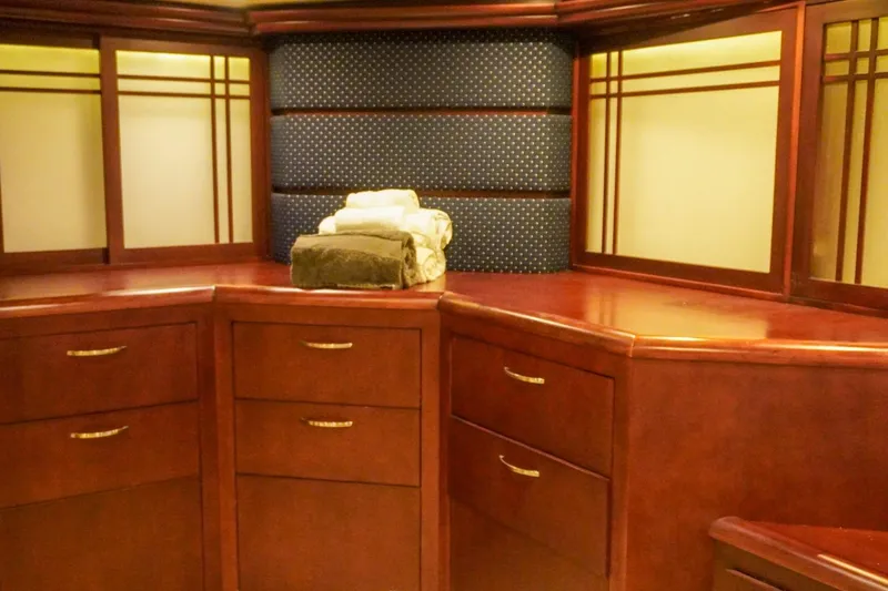 Slide: The Image of Luxurious wooden cabinetry in 1990 Hatteras 62 Cockpit Motor Yacht interior. - 56