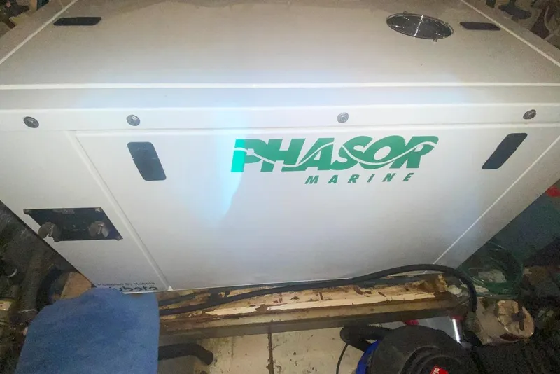 Slide: The Image of Phasor Marine generator on 1990 Hatteras 62 Cockpit Motor Yacht. - 70