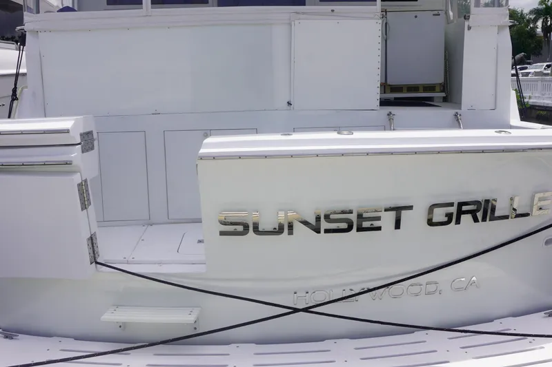 Slide: The Image of 1990 Hatteras 62 Cockpit Motor Yacht, "Sunset Grille," docked in Hollywood, CA. - 8