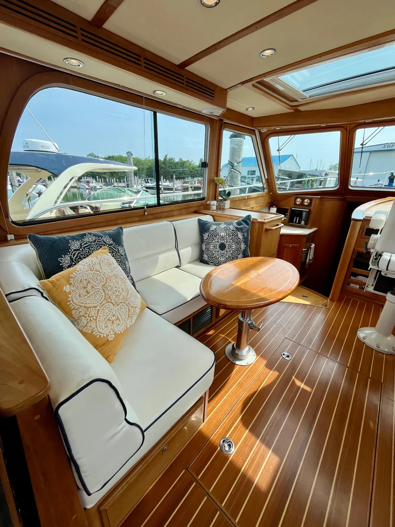 Slide: The Image of Luxurious interior of 2010 Sabre 40 Sedan yacht with elegant seating and wooden finishes. - 14