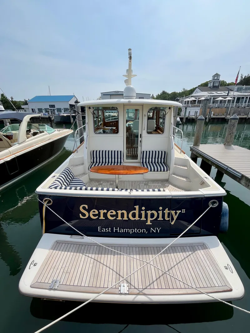Slide: The Image of 2010 Sabre 40 Sedan boat named "Serendipity II" docked in East Hampton, NY. - 2