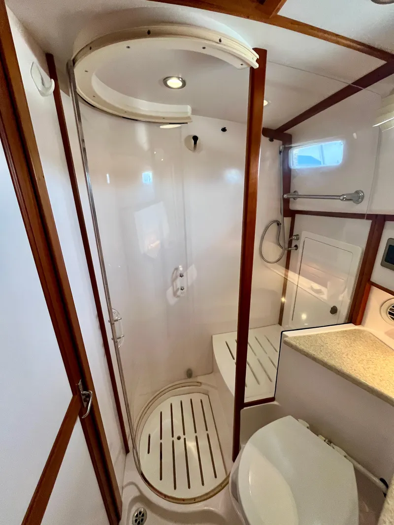 Slide: The Image of Bathroom interior of 2010 Sabre 40 Sedan yacht with shower and toilet. - 36