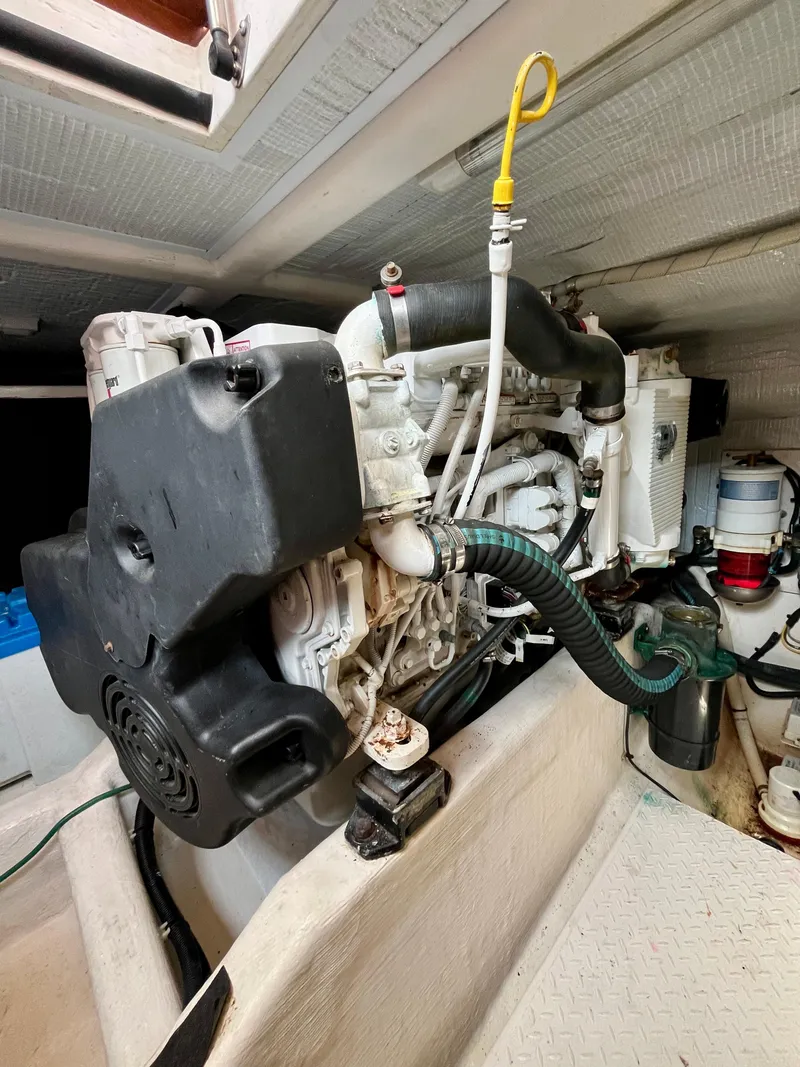 Slide: The Image of Engine compartment of a 2010 Sabre 40 Sedan, showcasing detailed mechanical components. - 41