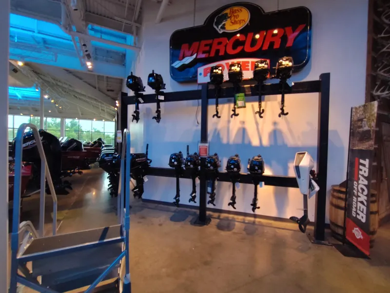 Slide: The Image of Display of Mercury outboard motors at Bass Pro Shops, featuring Tracker Pro Guide V-175 WT. - 48