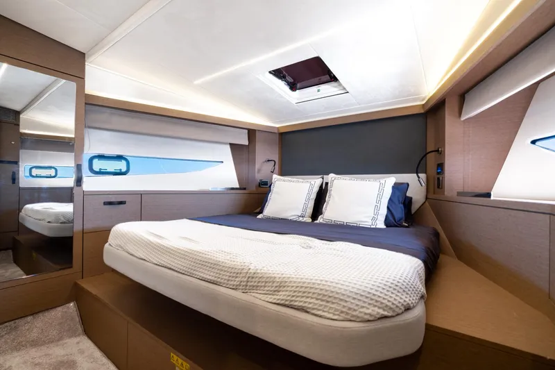 Slide: The Image of Luxurious bedroom interior of 2020 Prestige 420 yacht with modern design and elegant lighting. - 30