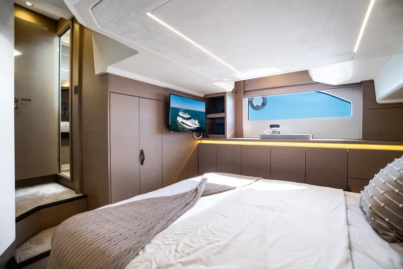 Slide: The Image of Luxurious interior of 2020 Prestige 420 yacht bedroom with modern design and ocean view. - 36