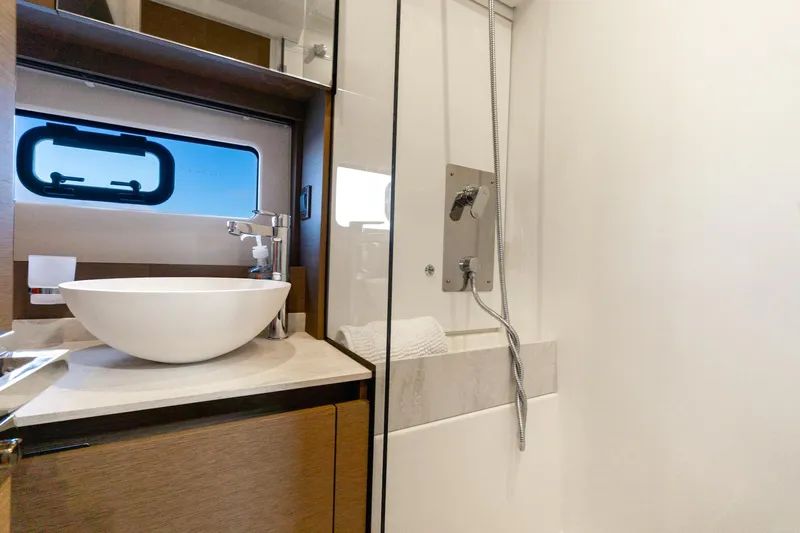 Slide: The Image of Luxurious bathroom in 2020 Prestige 420 yacht with modern sink and shower. - 38