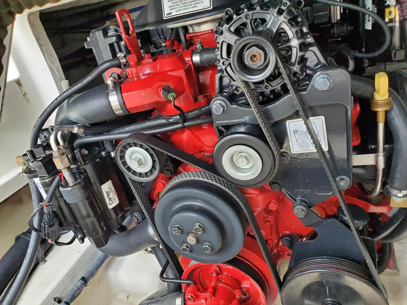 Slide: The Image of Engine of a 2007 Crownline 220EX boat, showcasing detailed mechanical components. - 41