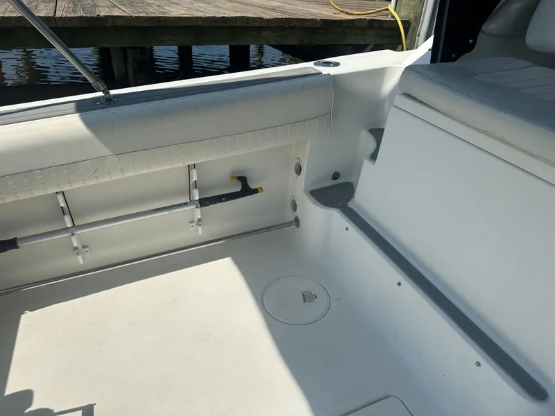 Slide: The Image of 2006 Hydra-Sports Vector 2900 VX boat interior with rod holder and seating area. - 20