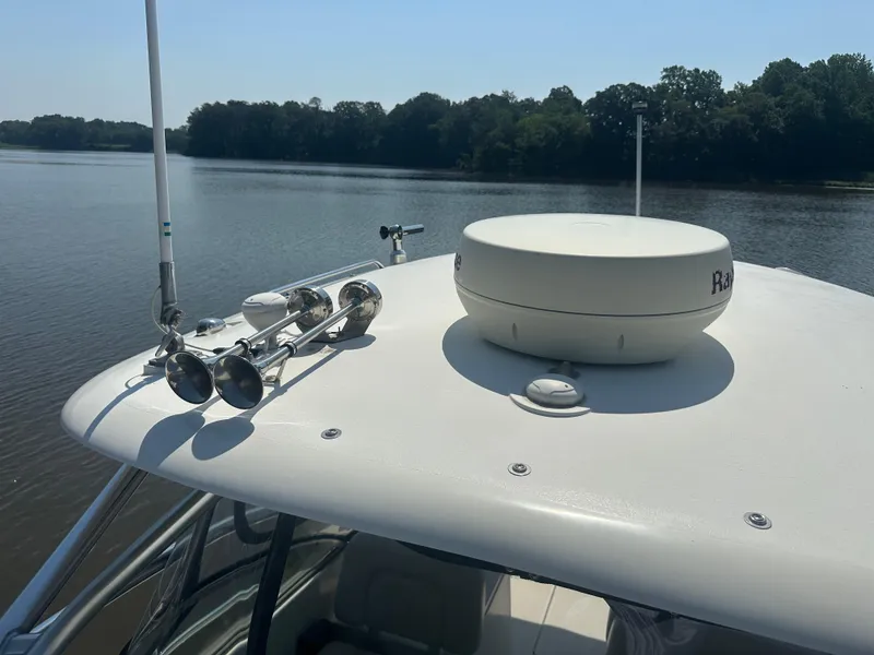 Slide: The Image of 2006 Hydra-Sports Vector 2900 VX boat with radar and horns on calm water. - 40