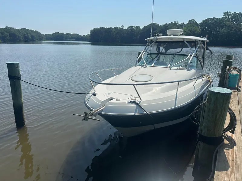 Slide: The Image of 2006 Hydra-Sports Vector 2900 VX boat docked on a calm lake. - 8