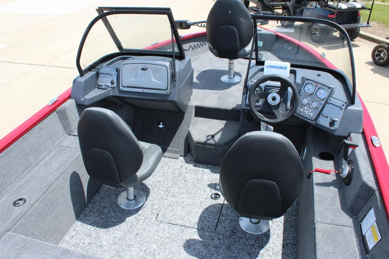 Slide: The Image of 2025 Tracker Pro Guide V-175 Combo boat interior with steering console and seating. - 8