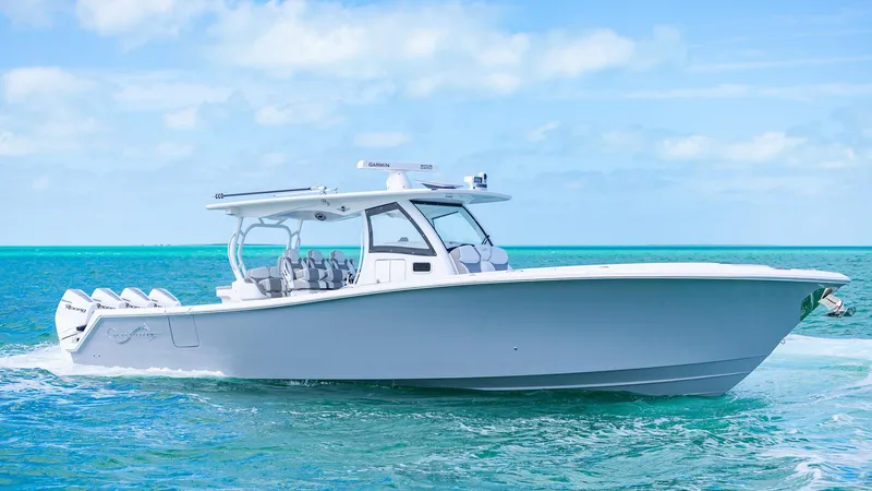 The Image of 2025 Blackwater 43 Sportfish boat cruising on clear blue ocean waters. - 0