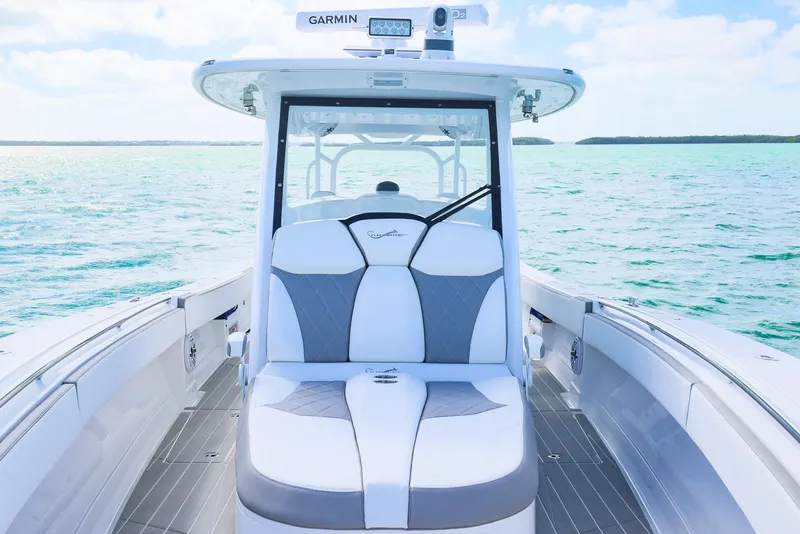 Slide: The Image of 2025 Blackwater 43 Sportfish boat interior with luxurious seating on open water. - 11