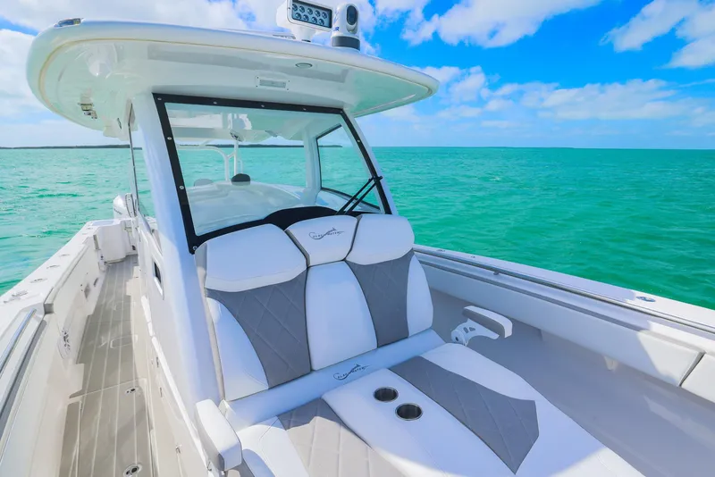 Slide: The Image of 2025 Blackwater 43 Sportfish boat on turquoise ocean under blue sky. - 12