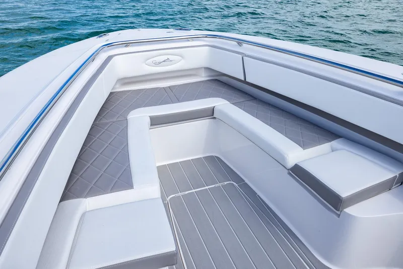 Slide: The Image of 2025 Blackwater 43 Sportfish boat interior with sleek seating and ocean view. - 13