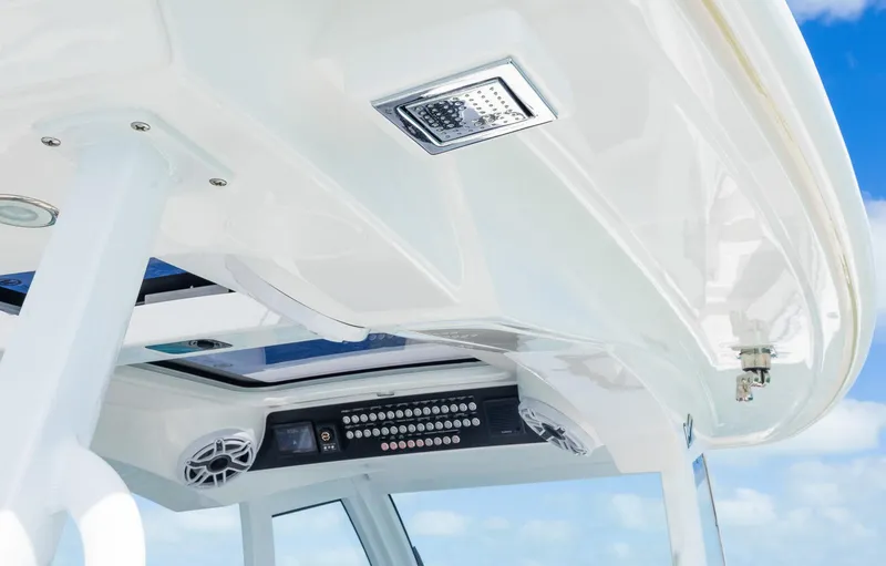 Slide: The Image of 2025 Blackwater 43 Sportfish boat interior with modern controls and speakers. - 18