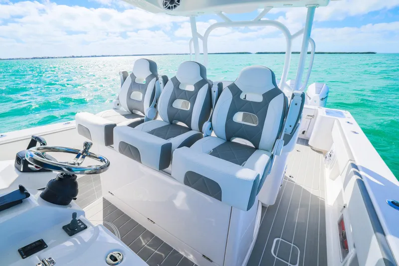 Slide: The Image of 2025 Blackwater 43 Sportfish boat interior with luxurious seating and ocean view. - 23