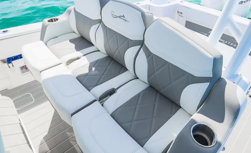Slide: The Image of Luxurious seating on 2025 Blackwater 43 Sportfish boat with diamond-stitched upholstery. - 24