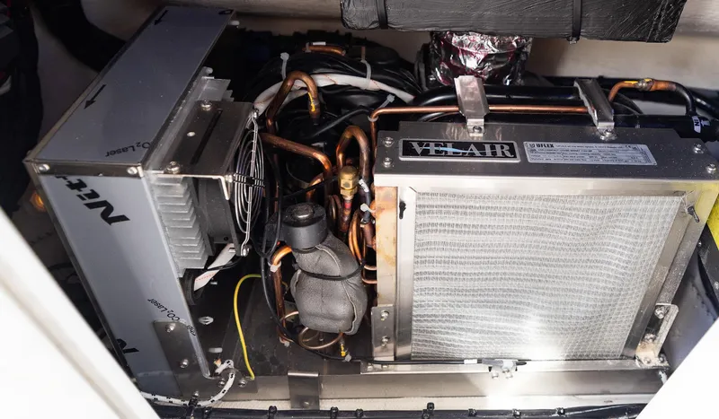 Slide: The Image of Engine room of 2025 Blackwater 43 Sportfish with Velair air conditioning unit. - 45