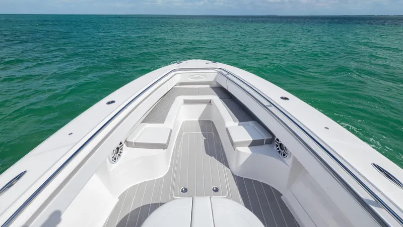 Slide: The Image of Bow view of 2025 Blackwater 43 Sportfish boat on open sea. - 7