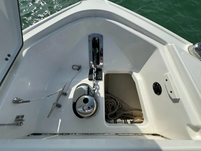 Slide: The Image of Anchor compartment of 2018 Monterey 378 Super Express boat with chain and rope. - 16