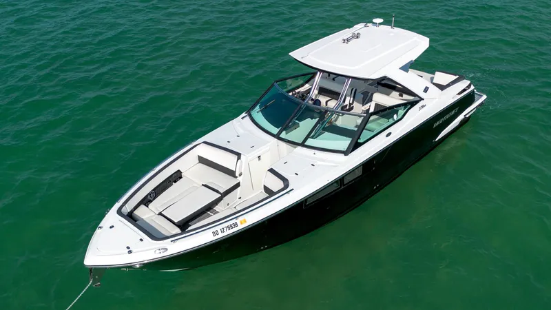 Slide: The Image of 2018 Monterey 378 Super Express boat on clear green water. - 4