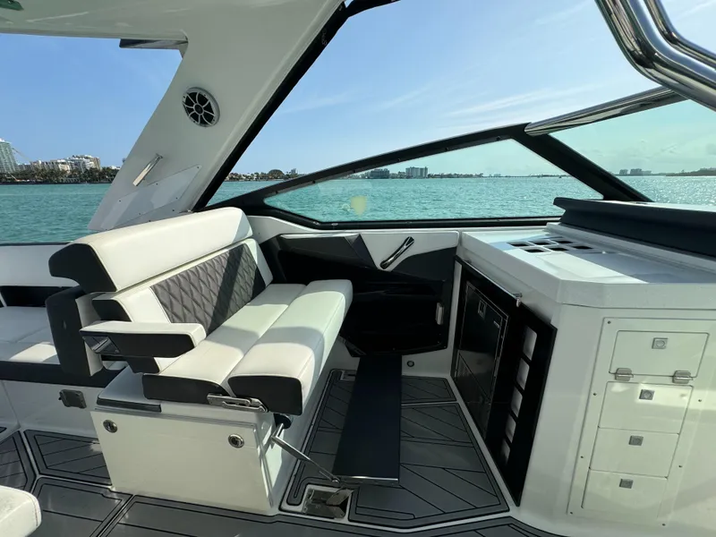 Slide: The Image of Interior of 2018 Monterey 378 Super Express yacht with luxurious seating and ocean view. - 11