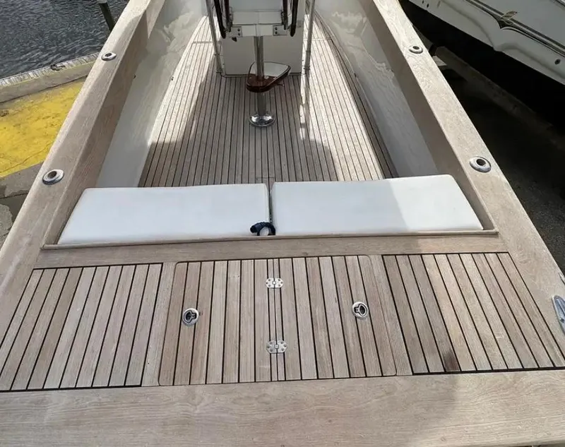 Slide: The Image of 2007 Buddy Davis 31 Custom boat with wooden deck detail at marina. - 11