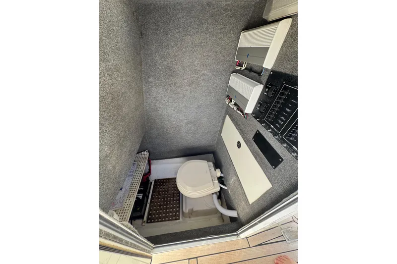 Slide: The Image of 2007 Buddy Davis 31 Custom boat interior with toilet and electrical panel. - 20