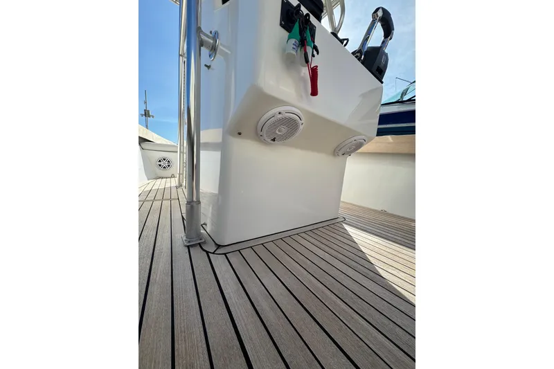 Slide: The Image of 2007 Buddy Davis 31 Custom boat deck with speakers and control panel. - 25