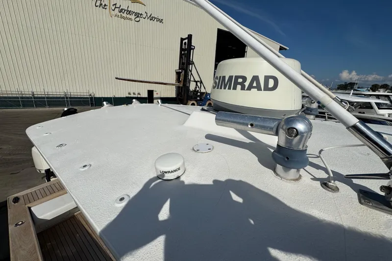 Slide: The Image of 2007 Buddy Davis 31 Custom boat with Simrad and Lowrance equipment at marina. - 30