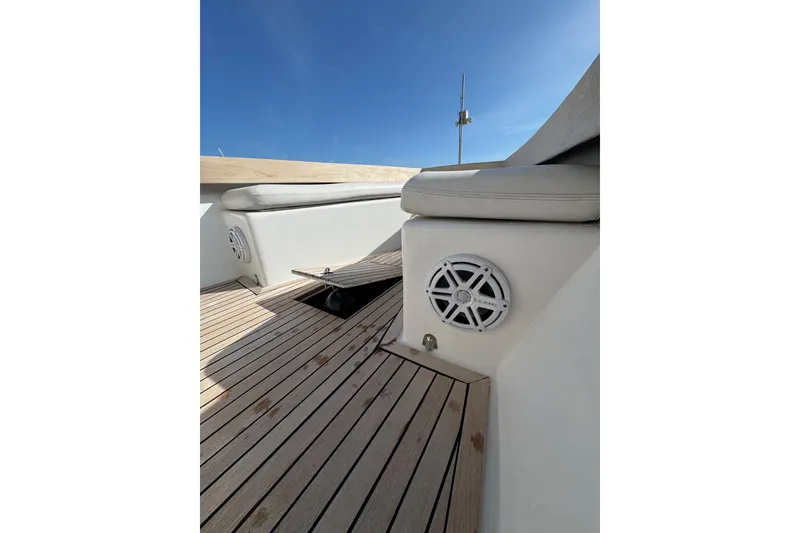 Slide: The Image of 2007 Buddy Davis 31 Custom boat deck with cushioned seating and speaker. - 33