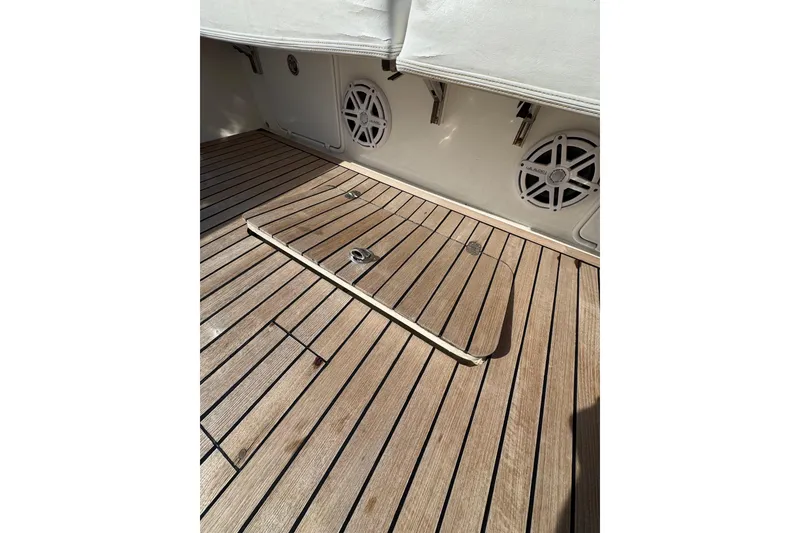 Slide: The Image of Teak deck of 2007 Buddy Davis 31 Custom boat with marine speakers. - 34