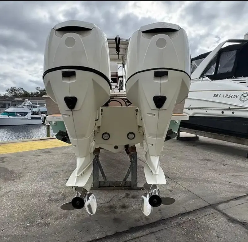 Slide: The Image of 2007 Buddy Davis 31 Custom boat with wooden deck and helm station. - 5