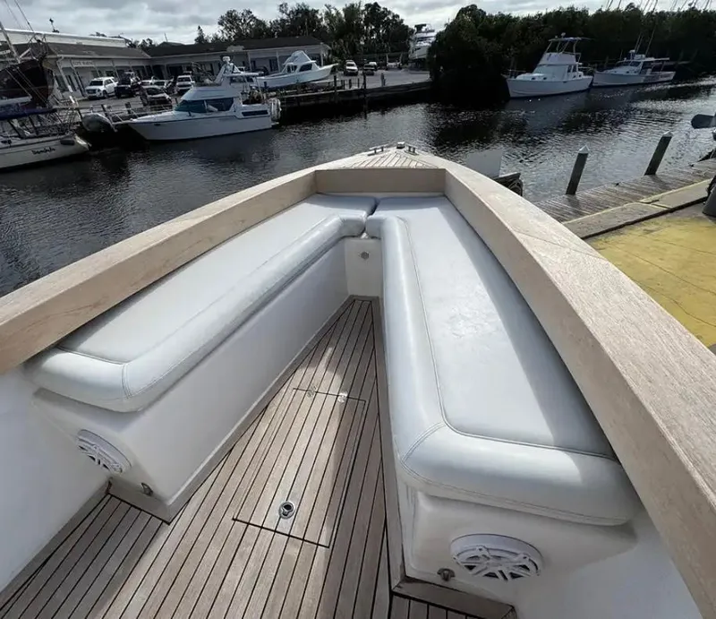 Slide: The Image of 2007 Buddy Davis 31 Custom boat deck with seating and wood finish. - 9