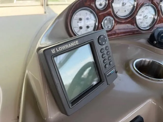 Slide: The Image of Dashboard of 2003 Rinker Fiesta Vee 342 with Lowrance navigation system. - 10