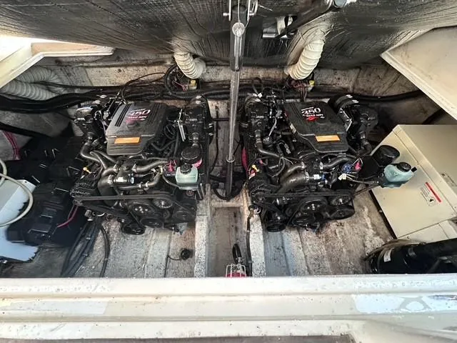 Slide: The Image of Twin engines in a 2003 Rinker Fiesta Vee 342 boat engine compartment. - 21