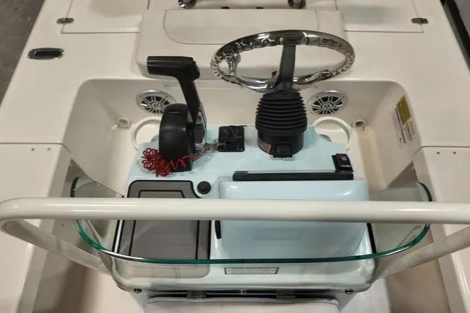 Slide: The Image of 2025 Spyder FX19 Vapor boat console with steering wheel and controls. - 15