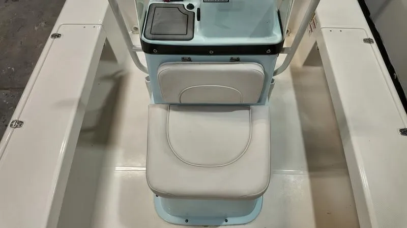Slide: The Image of 2025 Spyder FX19 Vapor boat interior with white seating and console. - 20