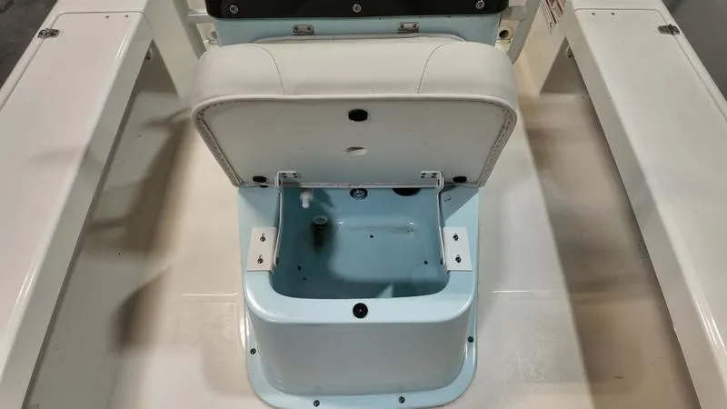 Slide: The Image of 2025 Spyder FX19 Vapor boat interior with open storage compartment. - 21