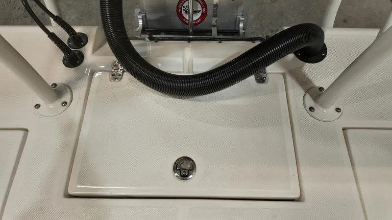 Slide: The Image of 2025 Spyder FX19 Vapor boat deck with hatch and hose detail. - 7