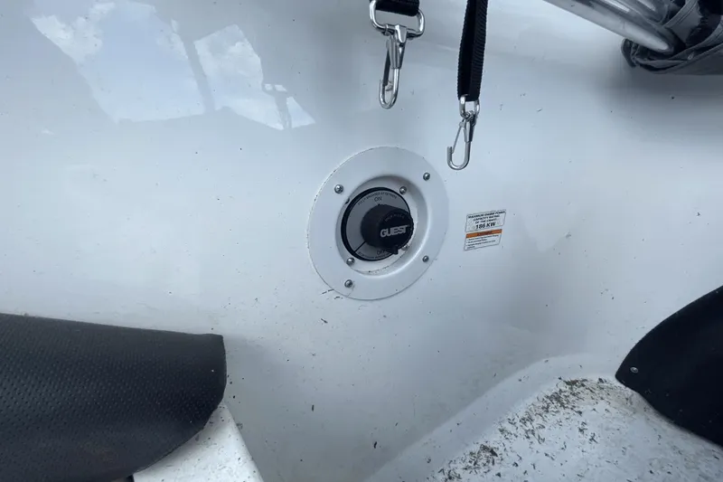 Slide: The Image of 2005 Sea-Doo Utopia 185 boat interior with charging port and safety hooks. - 18