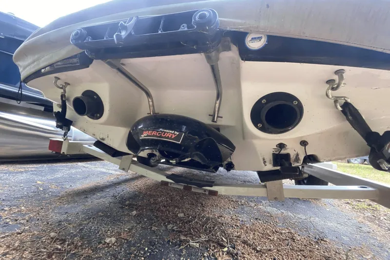 Slide: The Image of 2005 Sea-Doo Utopia 185 boat with Mercury engine, rear view on trailer. - 29