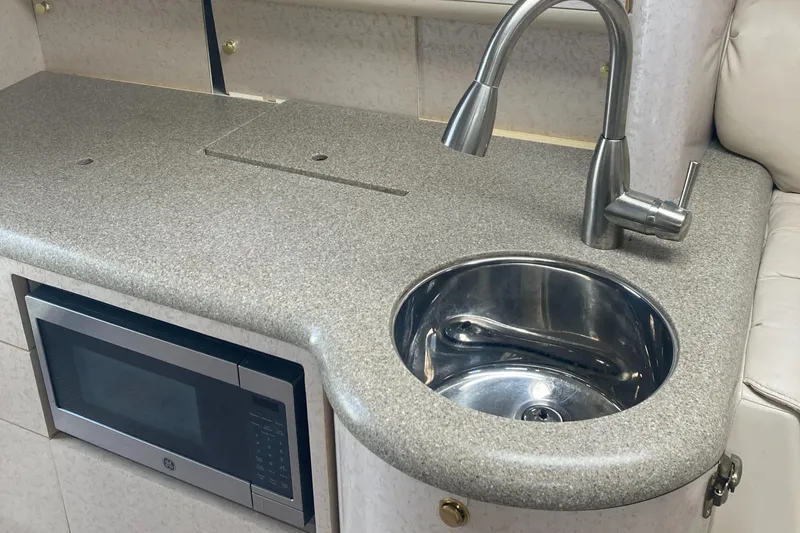 Slide: The Image of Companionway and galley with refrigerator to port - 12