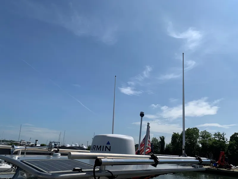 Slide: The Image of 2023 Life Proof 21 Hard Top boat with Garmin equipment under a clear blue sky. - 10