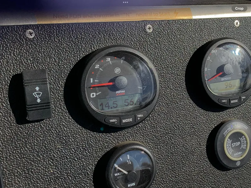 Slide: The Image of Dashboard of 2023 Life Proof 21 Hard Top boat with gauges and controls. - 5