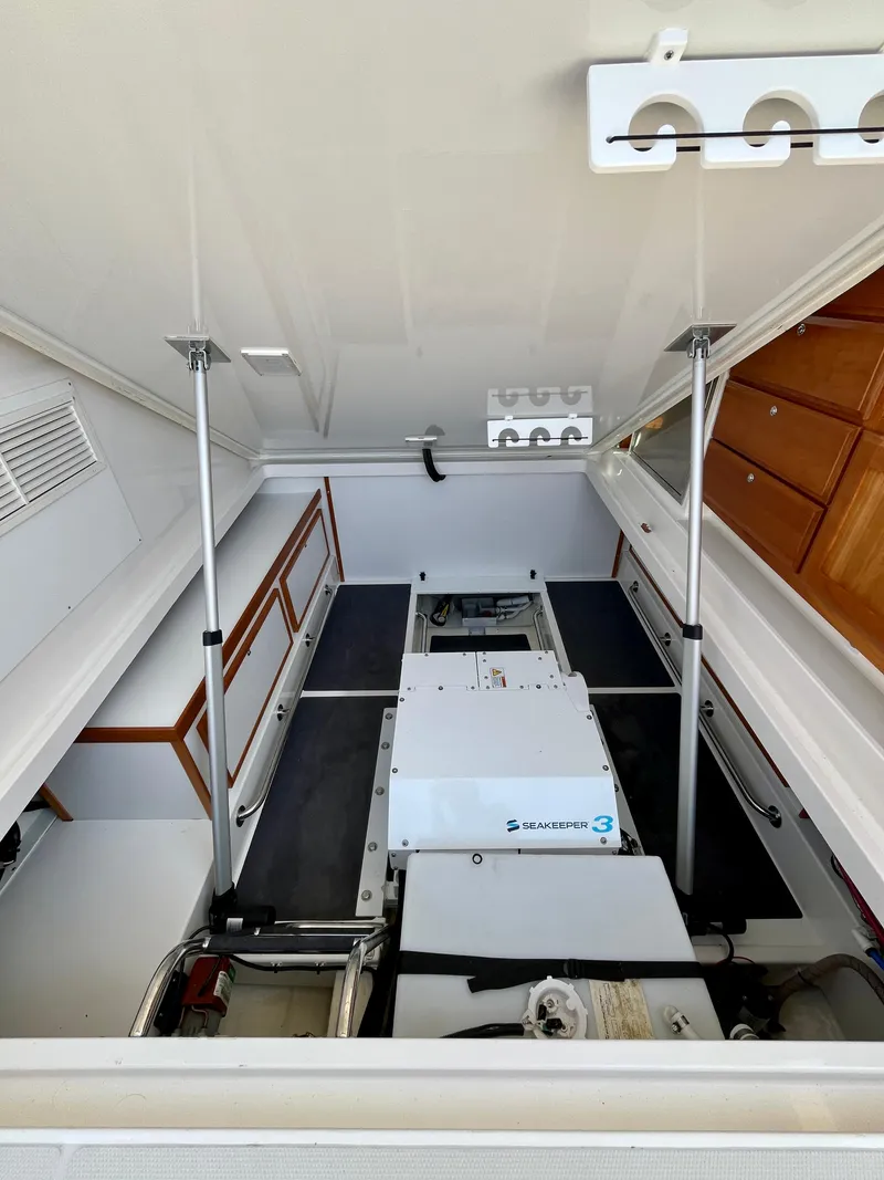Slide: The Image of 2023 Back Cove 34O engine room with Seakeeper 3 stabilizer system. - 29
