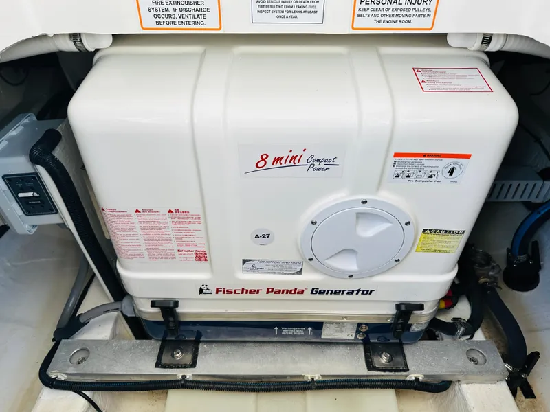 Slide: The Image of Fischer Panda generator in 2023 Back Cove 34O boat engine room. - 36