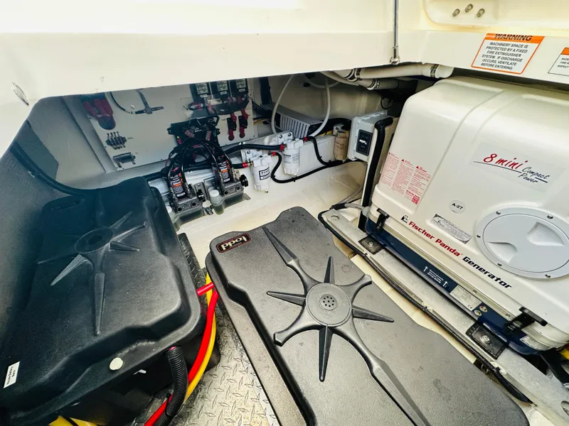 Slide: The Image of Engine room of 2023 Back Cove 34O with Fischer Panda generator and electrical components. - 37